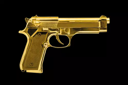 MondiLab Isolated golden pistol  (101102)